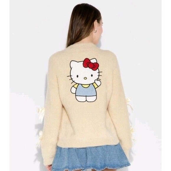 Sanrio Sweaters - Women's Hello Kitty Graphic Cardigan Size Medium Cream Blush Soft